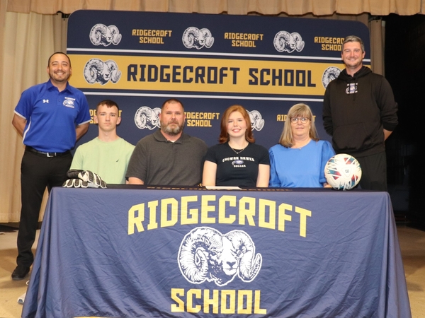 Cordrey with parents and CU coaches
